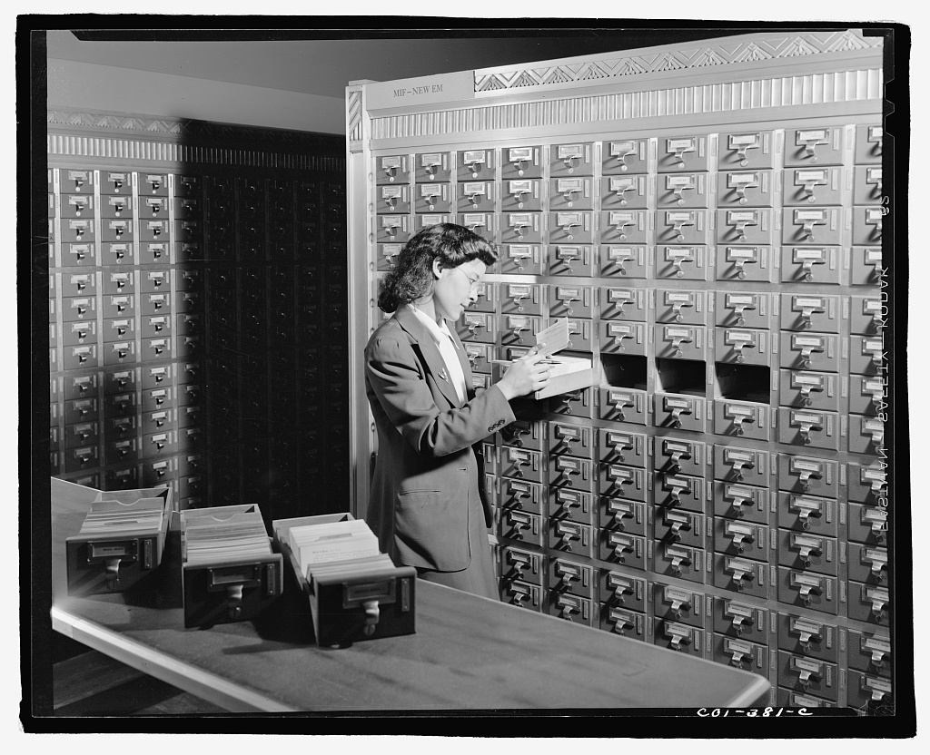 Image of a woman working with the card catalog in the Library of Congress, 1942